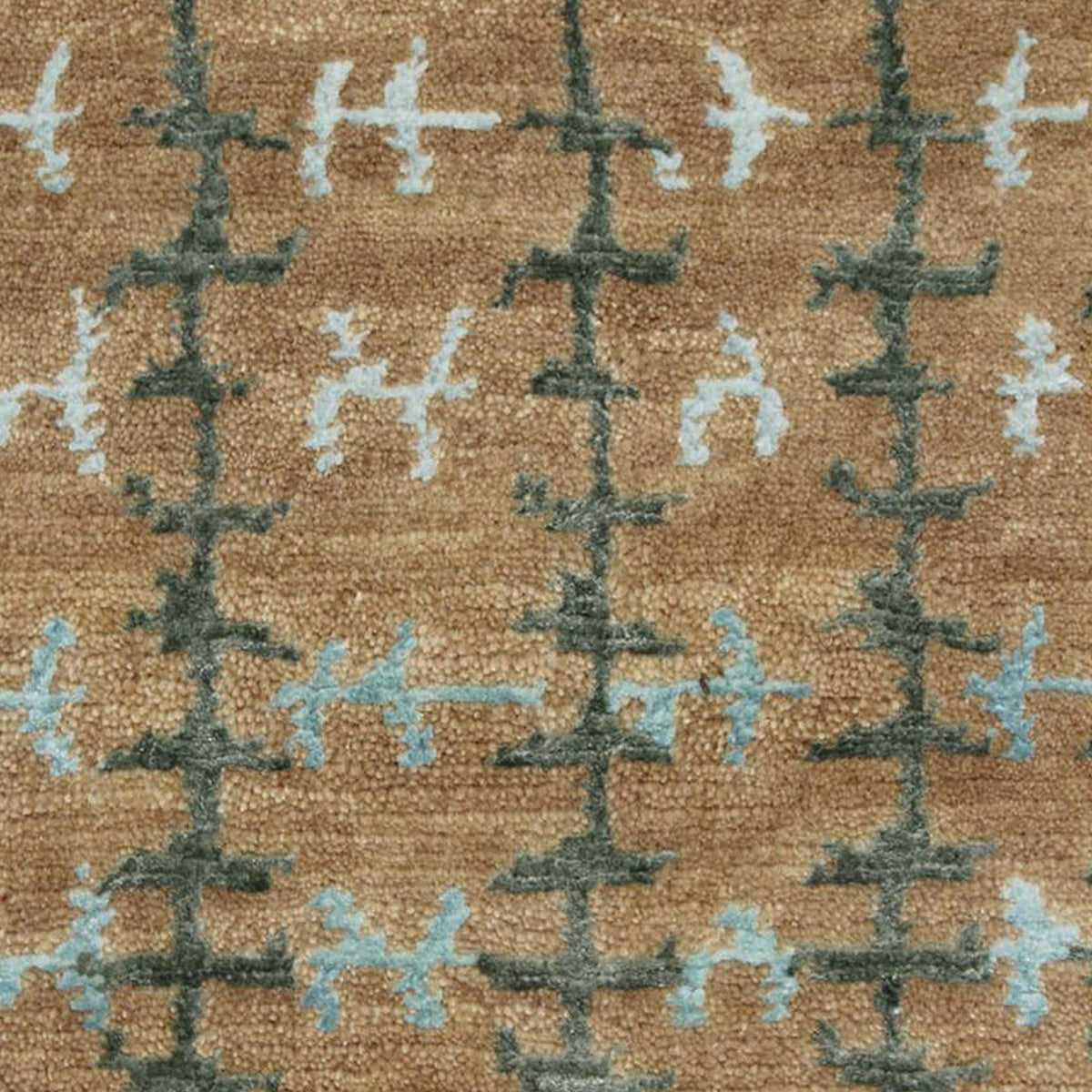 Whipstitch Stickley wool rug with a tan background and green and blue bamboo silk plaid pattern.
