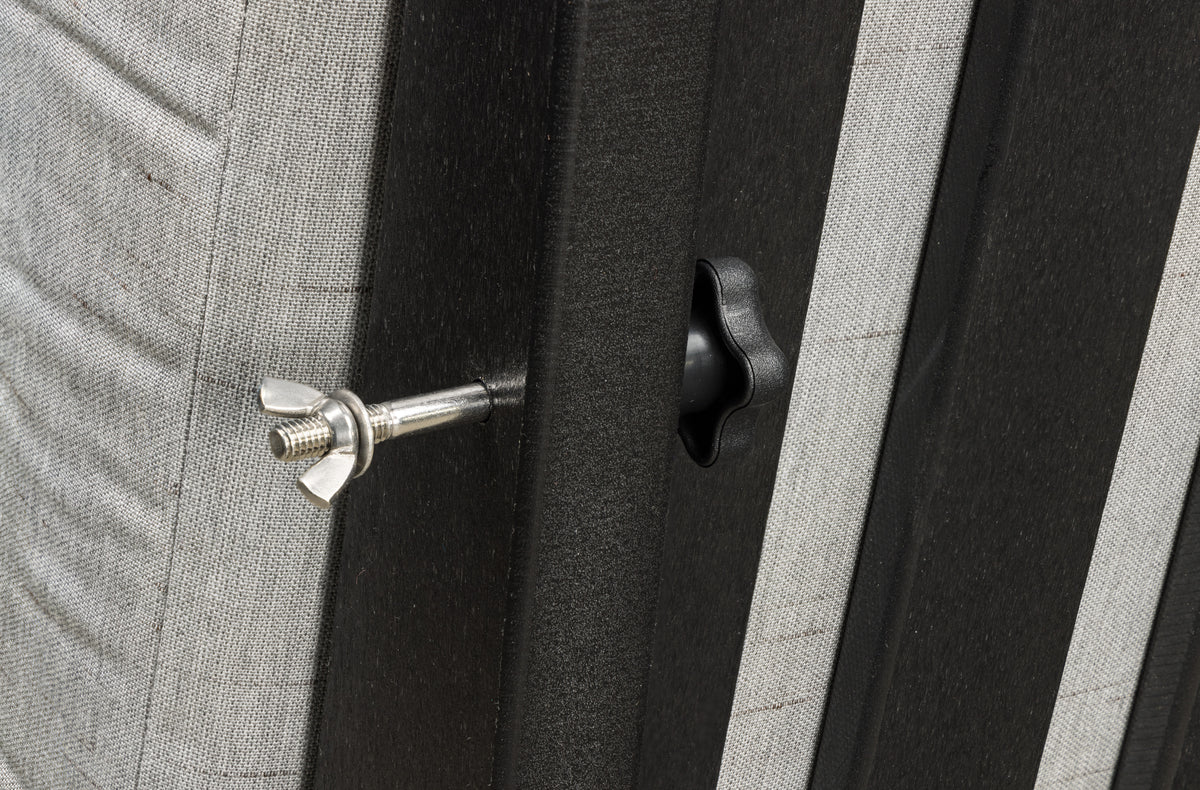 Stainless steel wing nut hardware locking black poly lumber sectional pieces together.