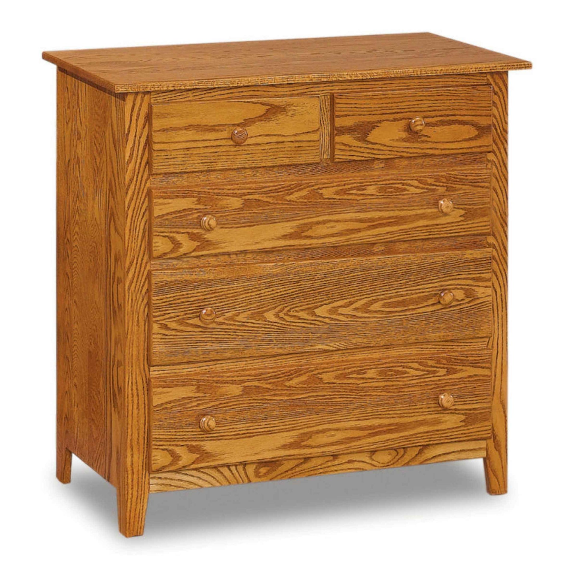Shaker 5-drawer chest in honey oak solid wood with visible grain and round wooden knobs.
