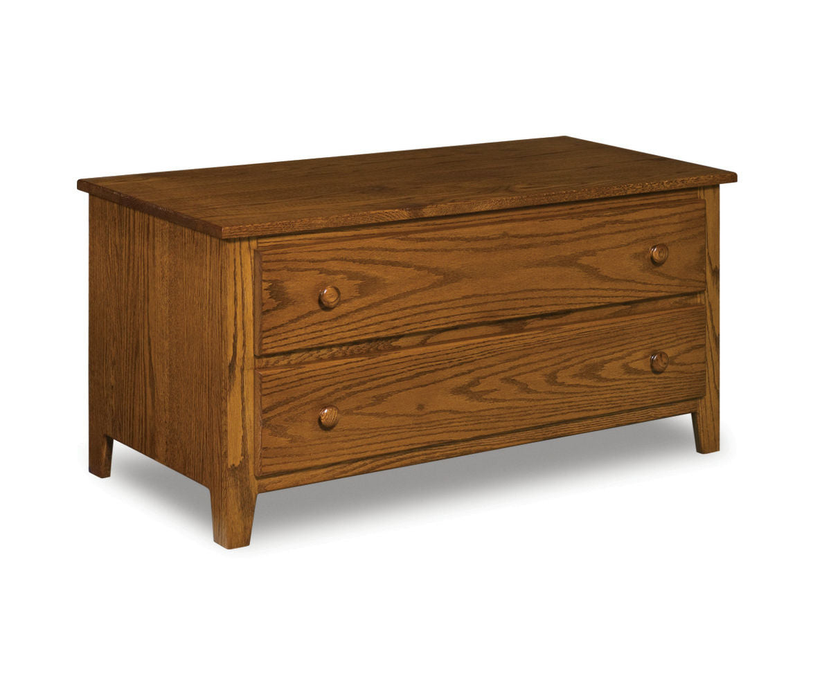 Shaker blanket chest in medium brown oak wood with two drawers and wooden knobs.