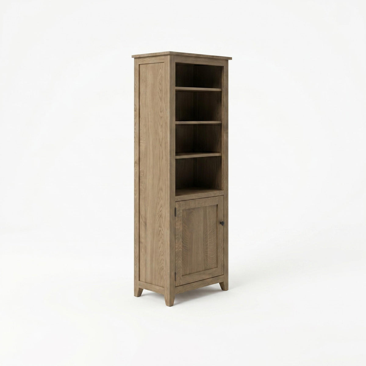 Simple Shaker bookcase in a light brown wood finish with open shelves and a bottom cabinet.