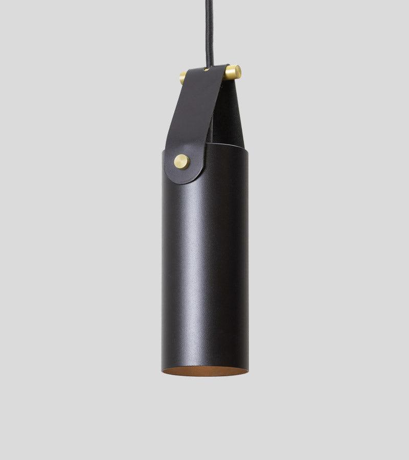 Spero Pendant minimalist black cylinder light with brass accents