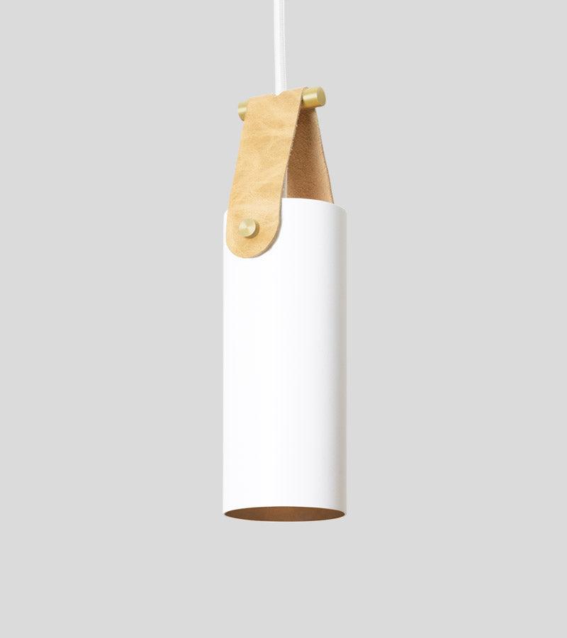 Spero white cylinder pendant light with tan leather strap and brass details.