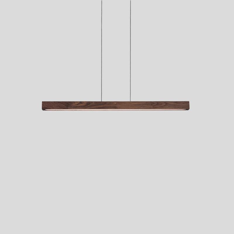 Una linear pendant chandelier in dark walnut wood with a minimalist recessed LED light.