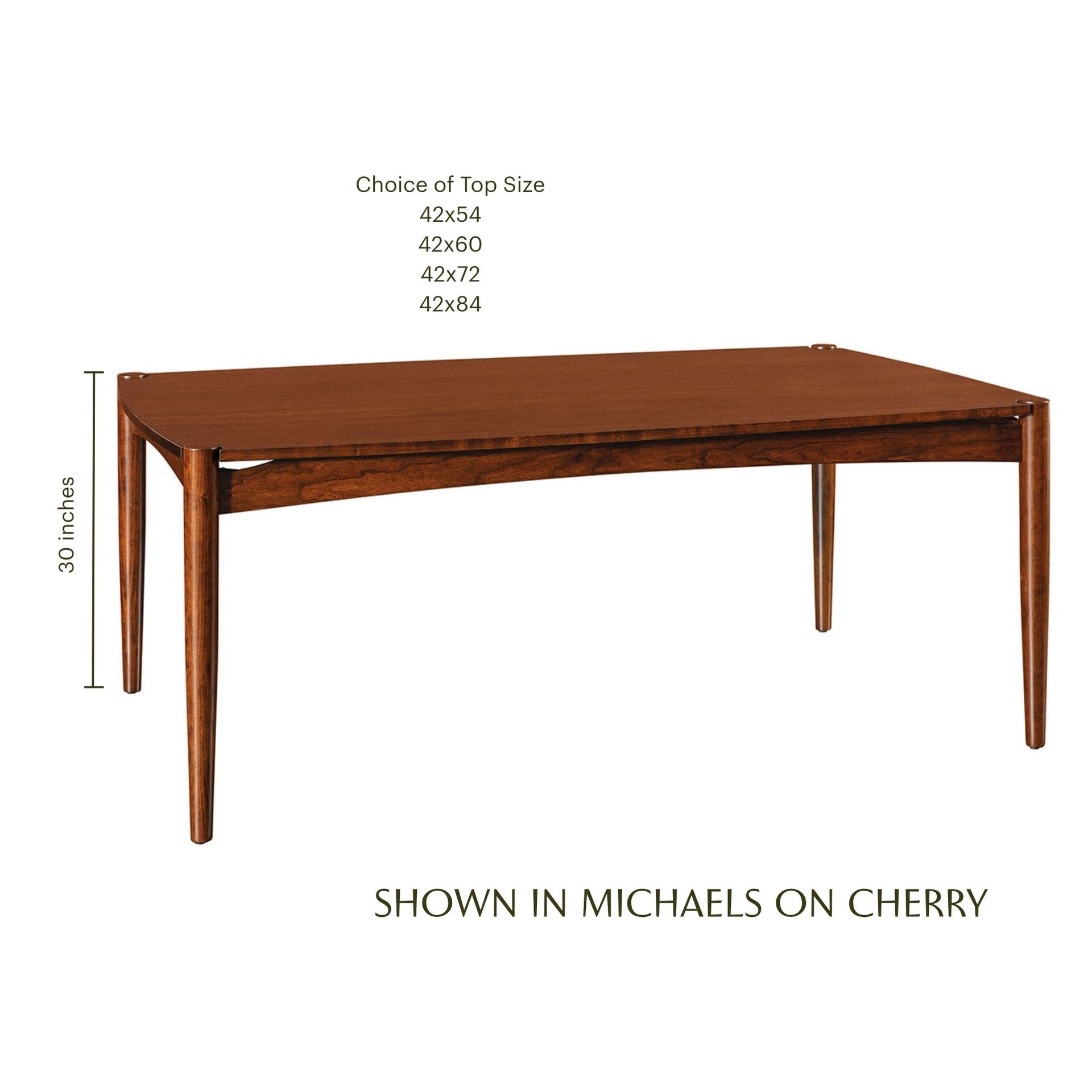 Wewatta solid cherry wood dining table with tapered legs in a Michaels finish.