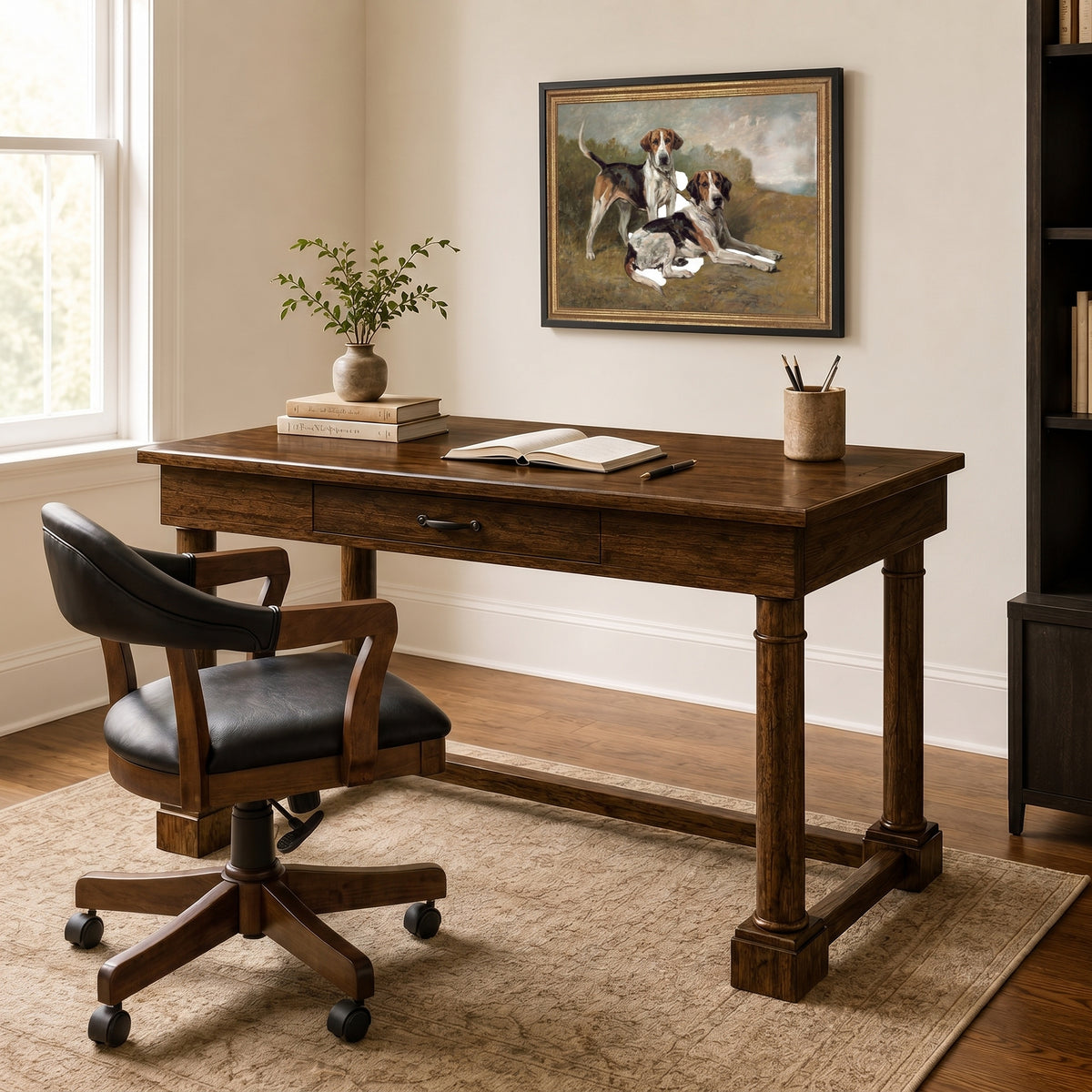 Elliott Desk Chair in dark wood with black leather upholstery next to a matching wooden desk.
