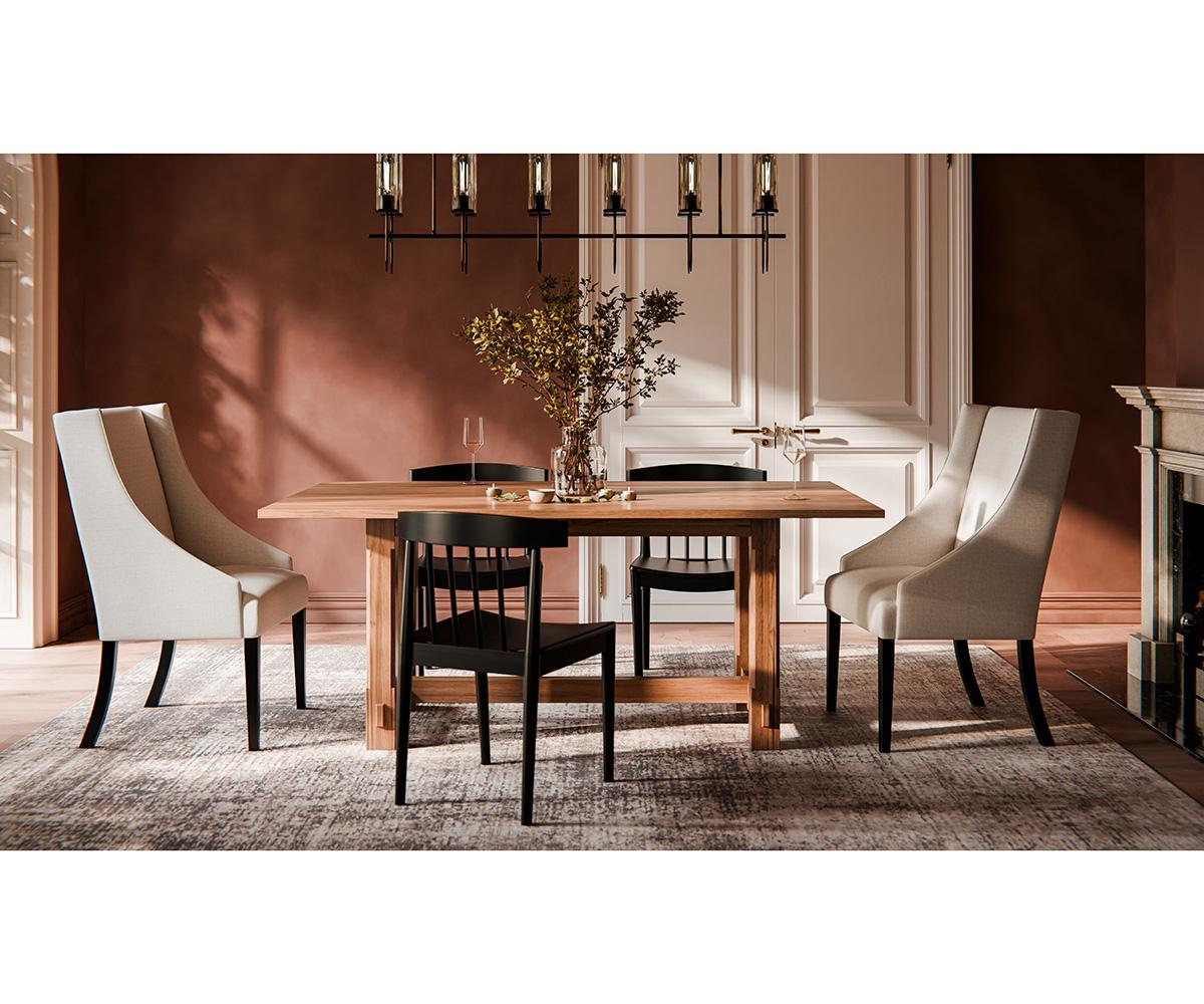 Magnolia wooden trestle dining table with black and beige chairs on a textured rug