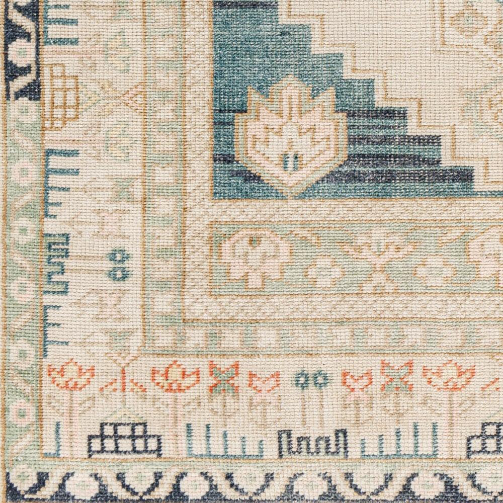 Anadolu hand-knotted wool and viscose rug with teal, beige, and orange geometric patterns.
