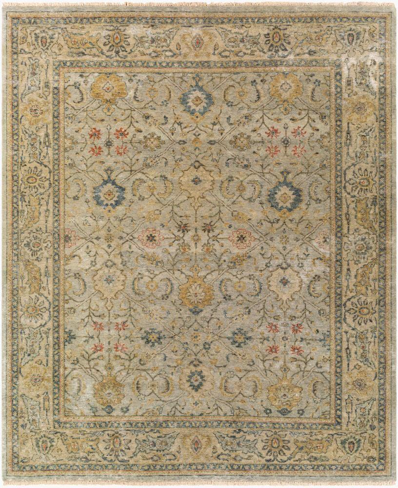 Anatolia hand-knotted wool rug featuring a traditional floral pattern in neutral, gold, and blue tones.