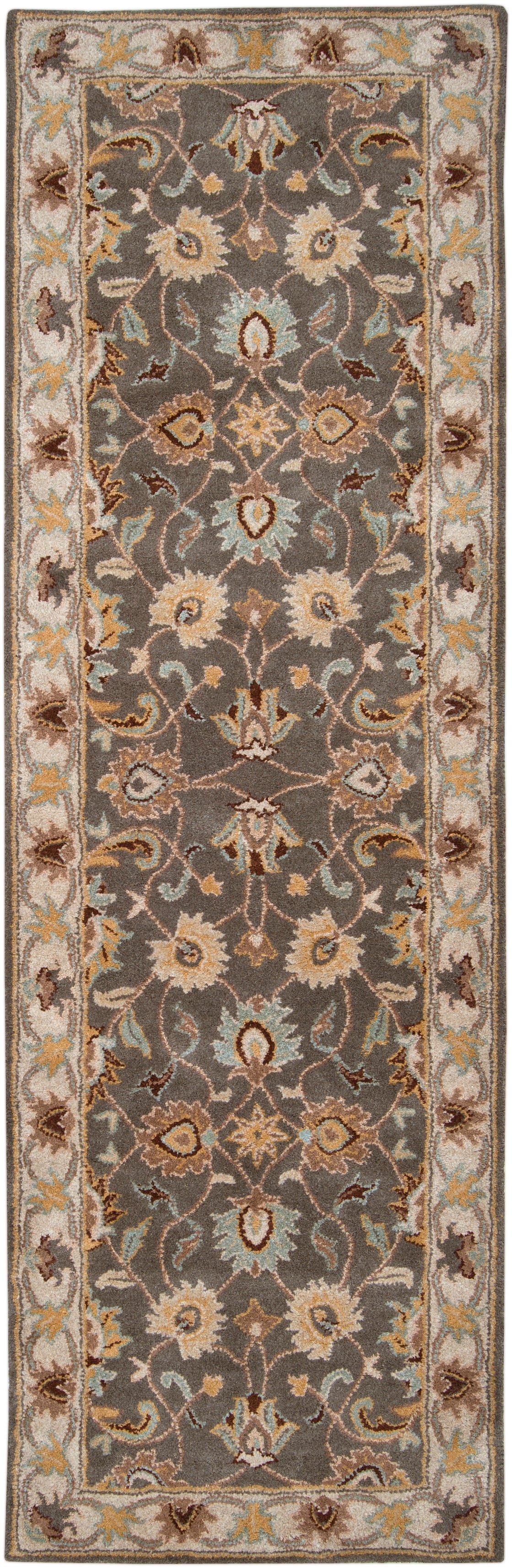 Nobility Flint hand-tufted wool runner rug with charcoal field and floral patterns in mustard, taupe, and grey.