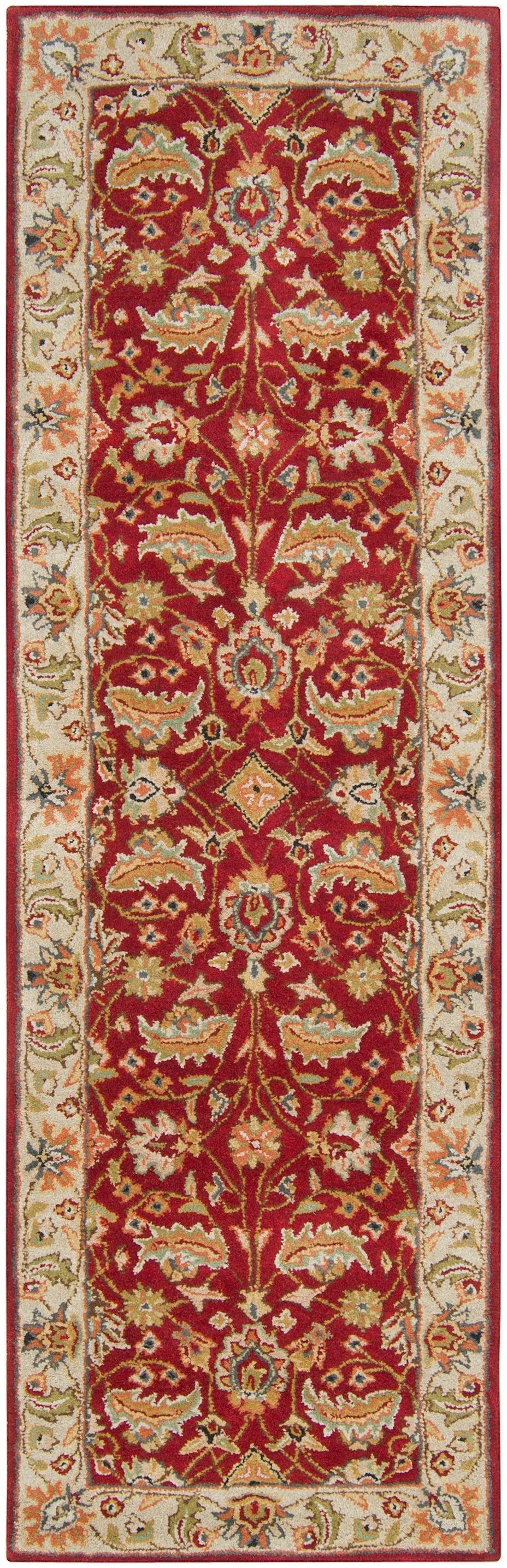Lucia Cinnamon hand-tufted wool runner rug with red and beige traditional floral patterns.