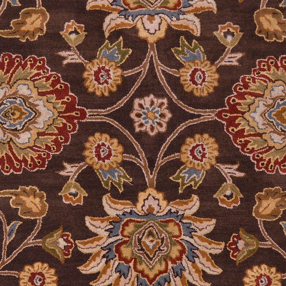 Mediterranean Umber hand-tufted wool rug with dark brown, red, and mustard floral patterns.