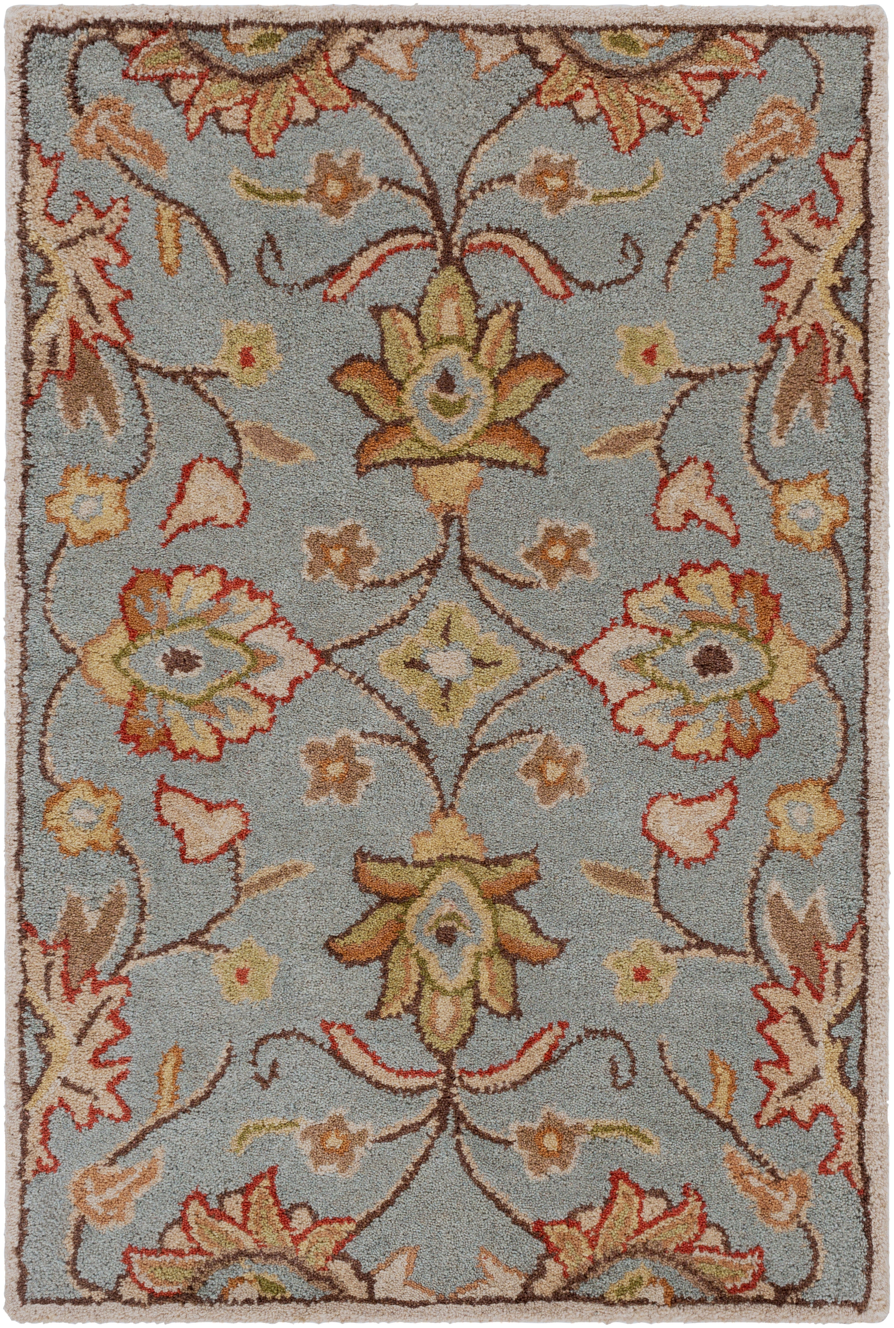 Mediterranean Cerulean hand-tufted wool rug with a classic floral pattern in blue, gold, and rust.