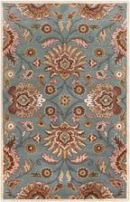 Mediterranean Cerulean hand-tufted wool rug with a classic floral pattern in blue, beige, and brown.
