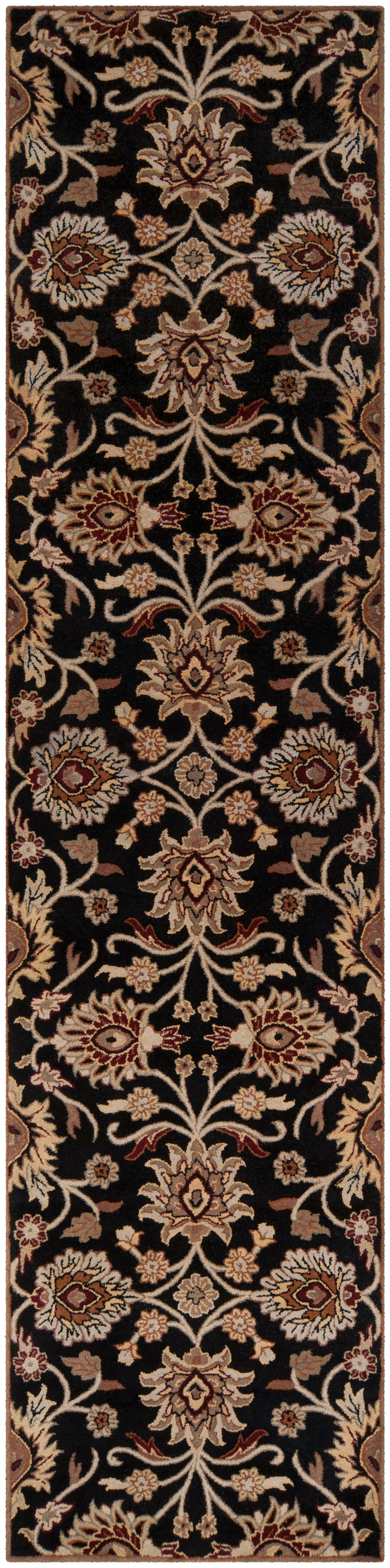 Mediterranean Ink hand-tufted wool runner rug with floral patterns on a black background.