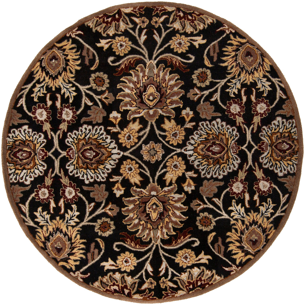 Round Mediterranean Ink hand-tufted wool rug with floral patterns on a black background.