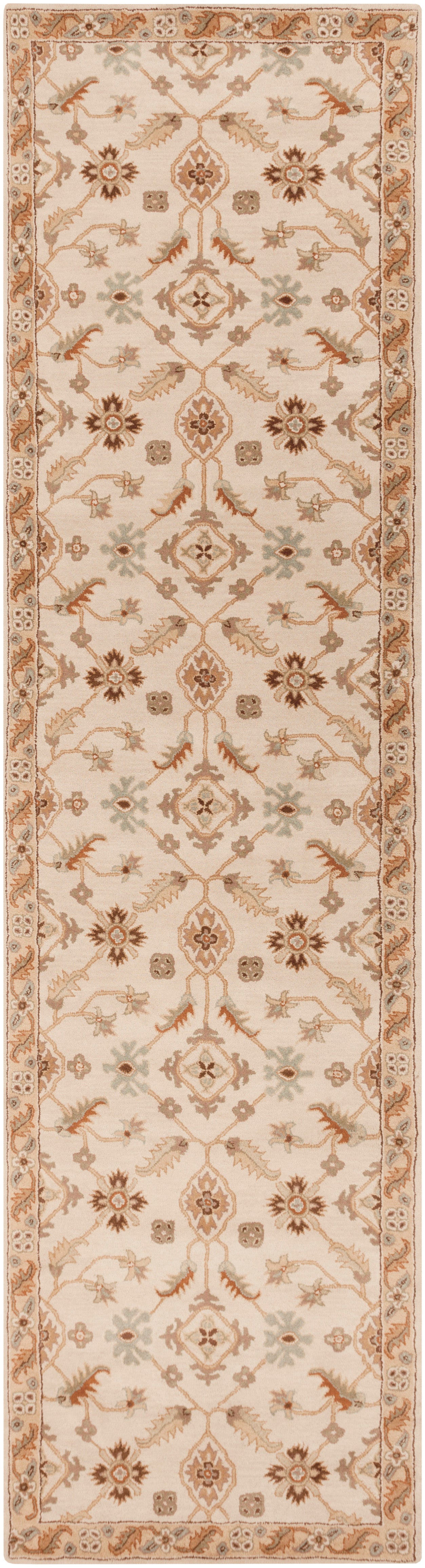 Carthage beige hand-tufted wool runner rug with traditional floral patterns.