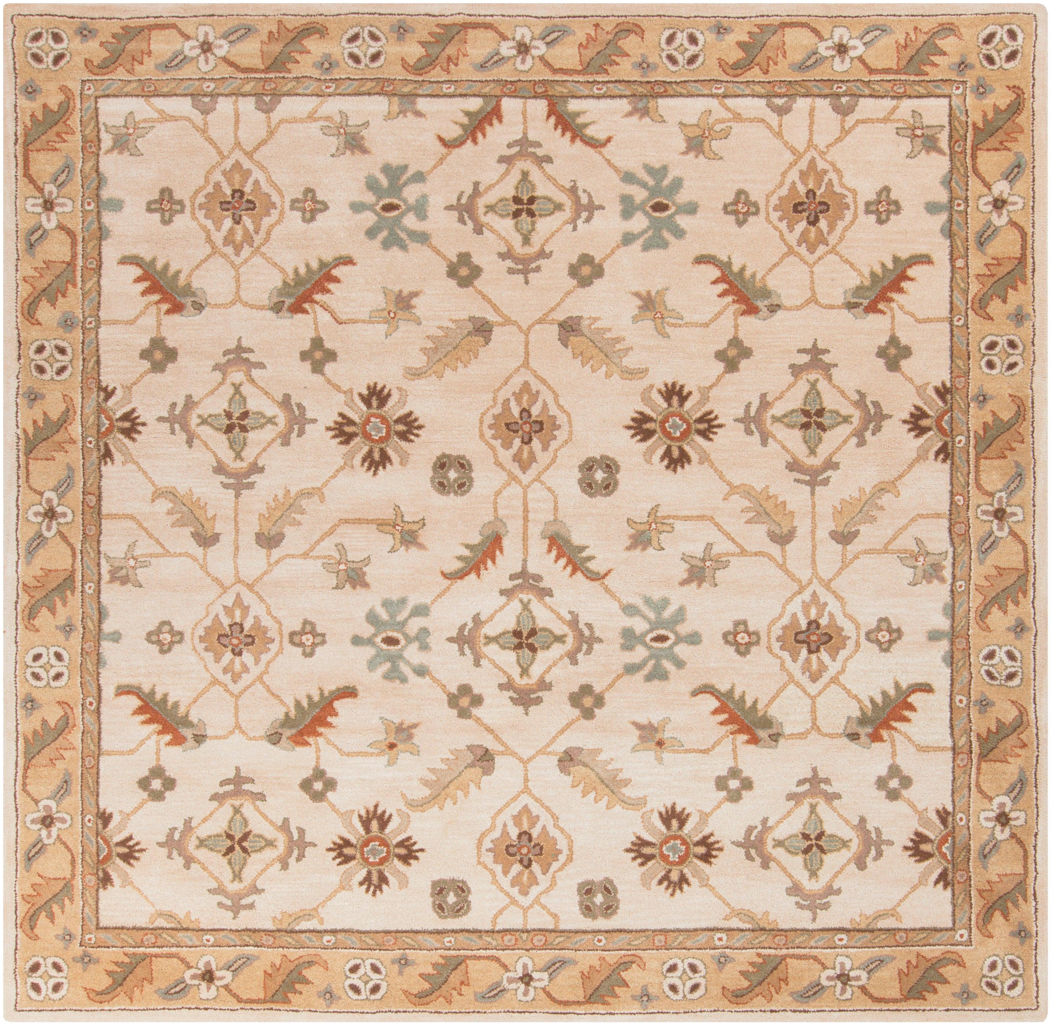 Carthage beige hand-tufted wool rug with traditional floral patterns and borders.