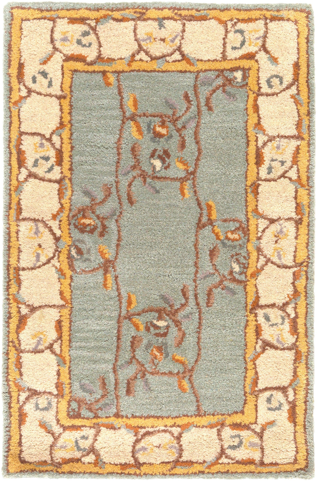 Corinth Azure hand-tufted wool rug with a light blue center, floral vine pattern, and cream border.