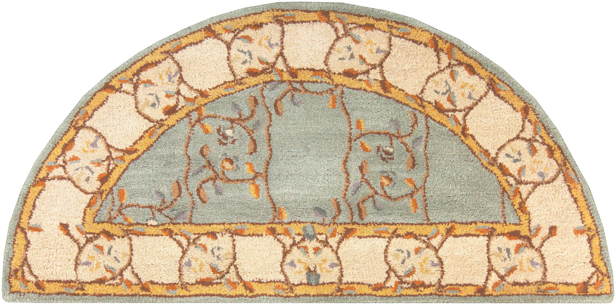 Half-round Corinth Azure hand-tufted wool rug with light blue center and floral border.