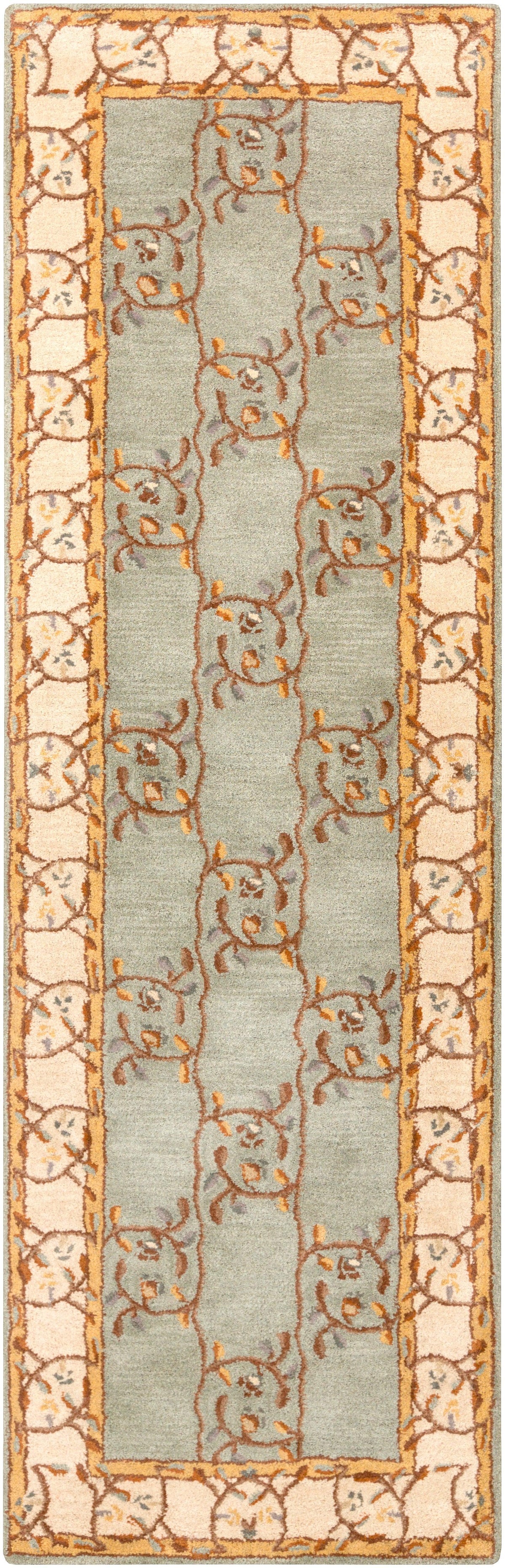 Corinth Azure hand-tufted wool runner rug with light blue center and floral border.