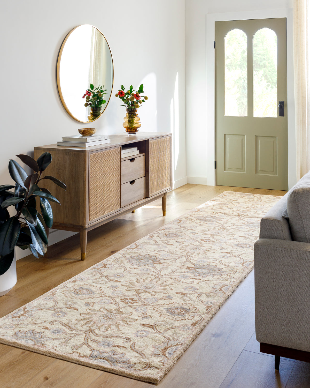 Mediterranean Lilac hand-tufted wool runner rug with floral patterns in a bright entryway.