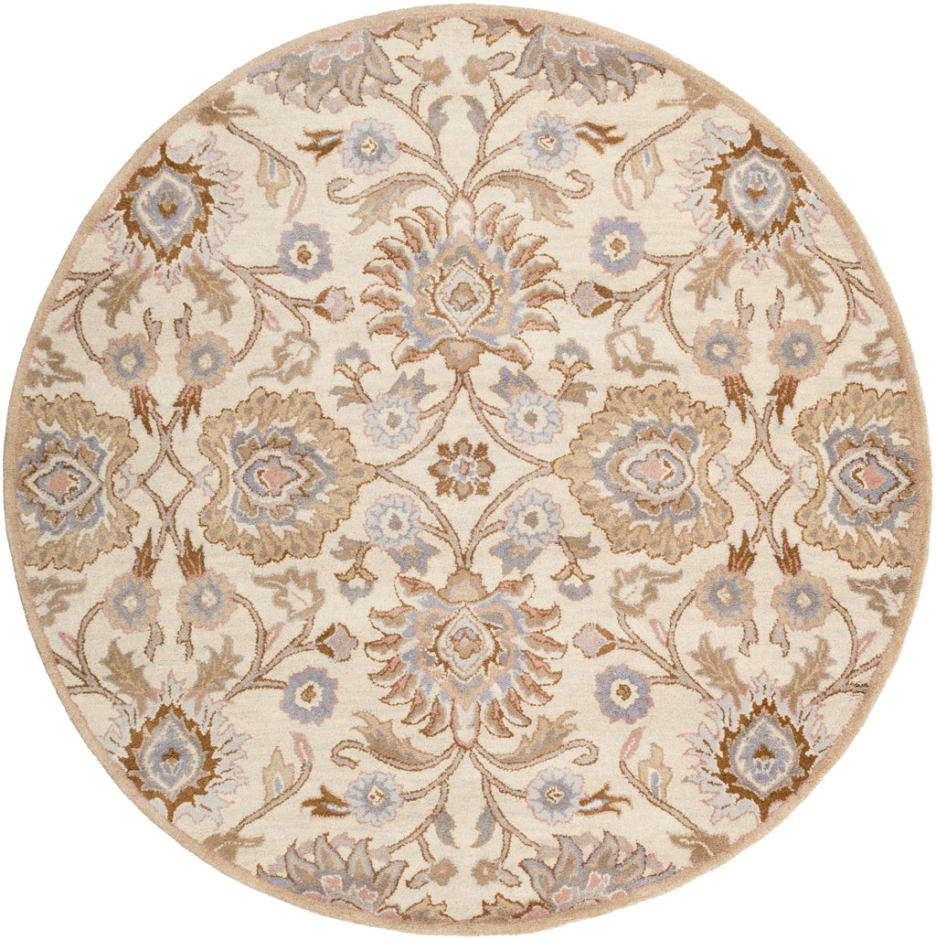 Round Mediterranean Lilac hand-tufted wool rug with beige, lavender, and brown floral patterns.