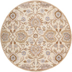 Round Mediterranean Lilac hand-tufted wool rug with beige, lavender, and brown floral patterns.
