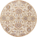 Round Mediterranean Lilac hand-tufted wool rug with beige, lavender, and brown floral patterns.
