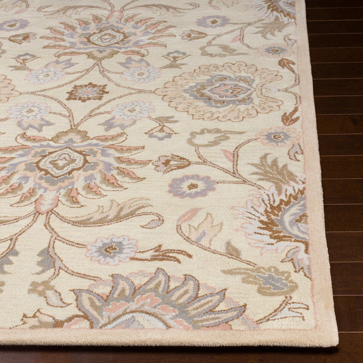 Mediterranean Lilac hand-tufted wool rug with a floral pattern in lavender, beige, and pink.