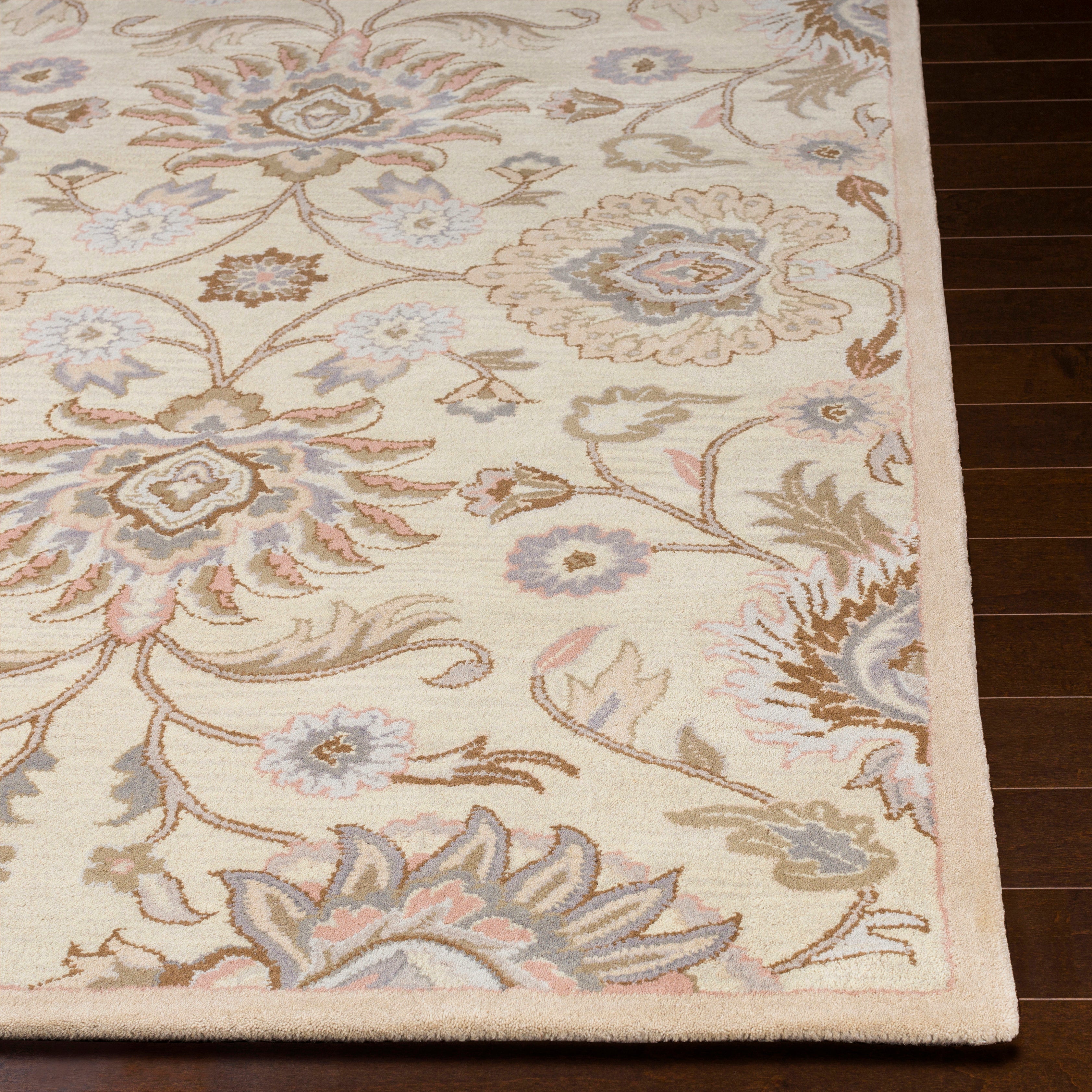 Mediterranean Lilac hand-tufted wool rug with a floral pattern in lavender, beige, and pink.