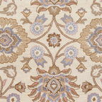 Mediterranean Lilac hand-tufted wool rug with beige, lavender, and brown floral patterns.