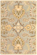Mediterranean Sky hand-tufted wool rug with sage, ivory, and olive floral patterns.