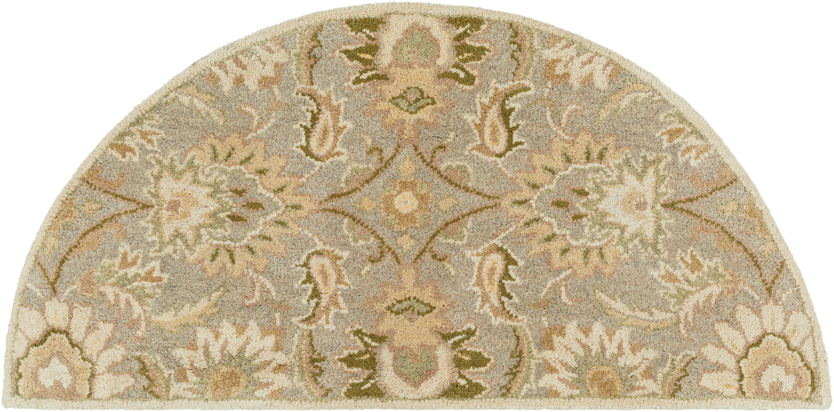 Half-circle Mediterranean Sky hand-tufted wool rug with sage, gray, and ivory floral patterns.