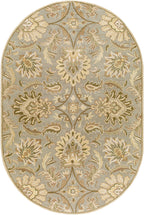 Oval Mediterranean Sky hand-tufted wool rug with gray, sage, and ivory floral patterns.