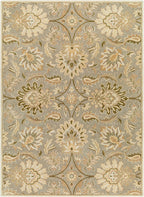 Mediterranean Sky hand-tufted wool rug with sage, ivory, and olive floral patterns.