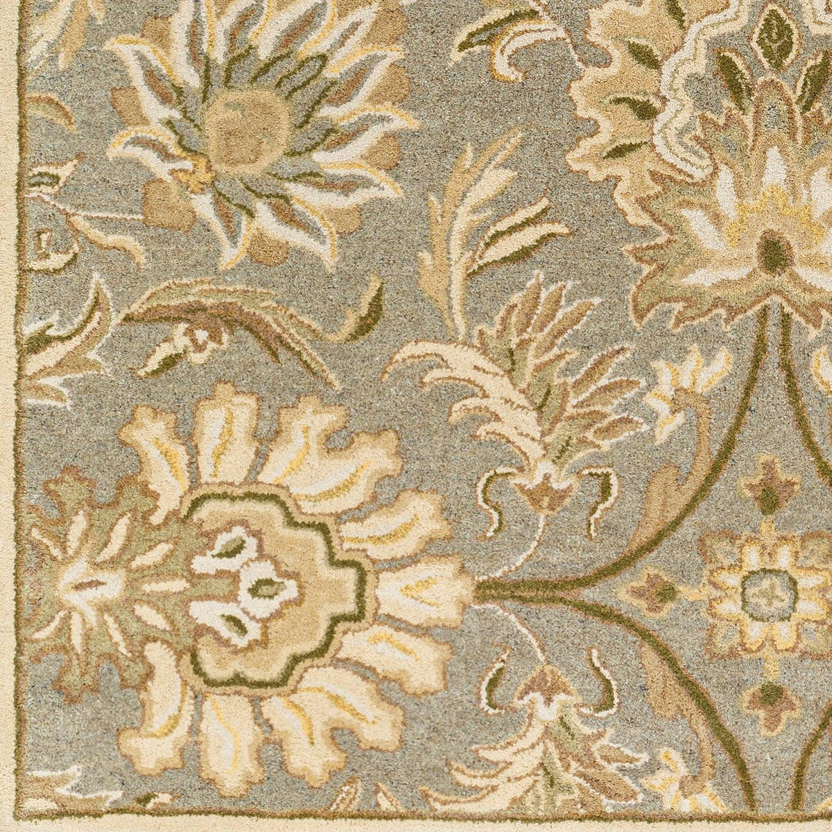 Mediterranean Sky hand-tufted wool rug with gray, sage, and ivory floral patterns.