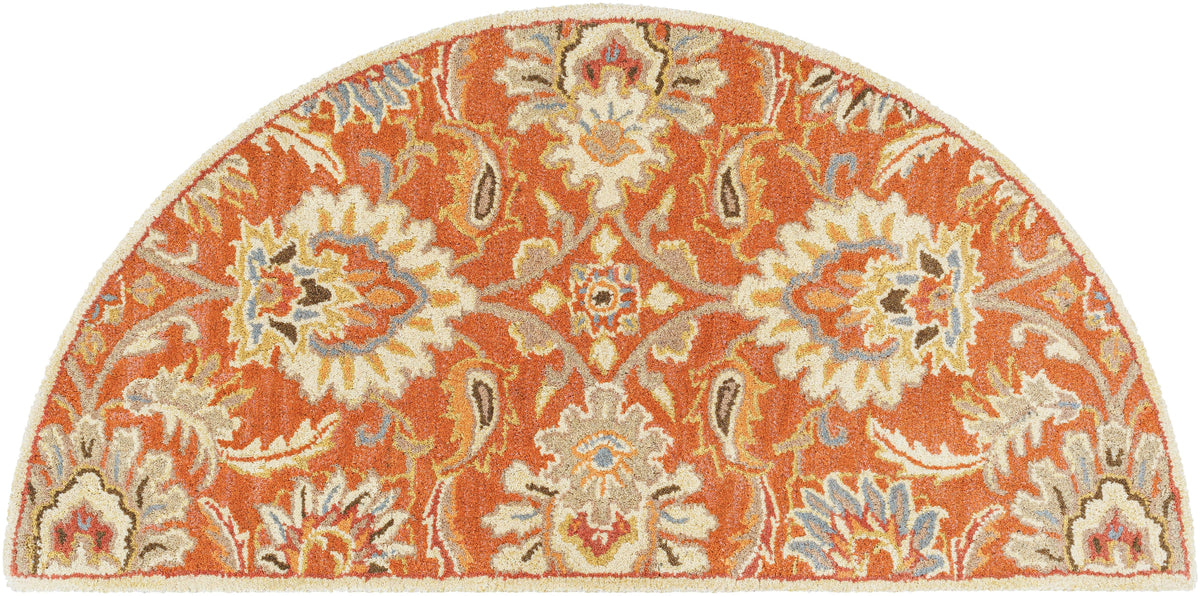 Half-circle burnt orange wool rug with Mediterranean floral patterns.