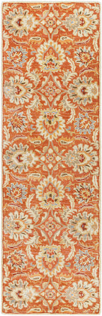 Mediterranean Cider hand-tufted wool runner rug with burnt orange floral patterns.