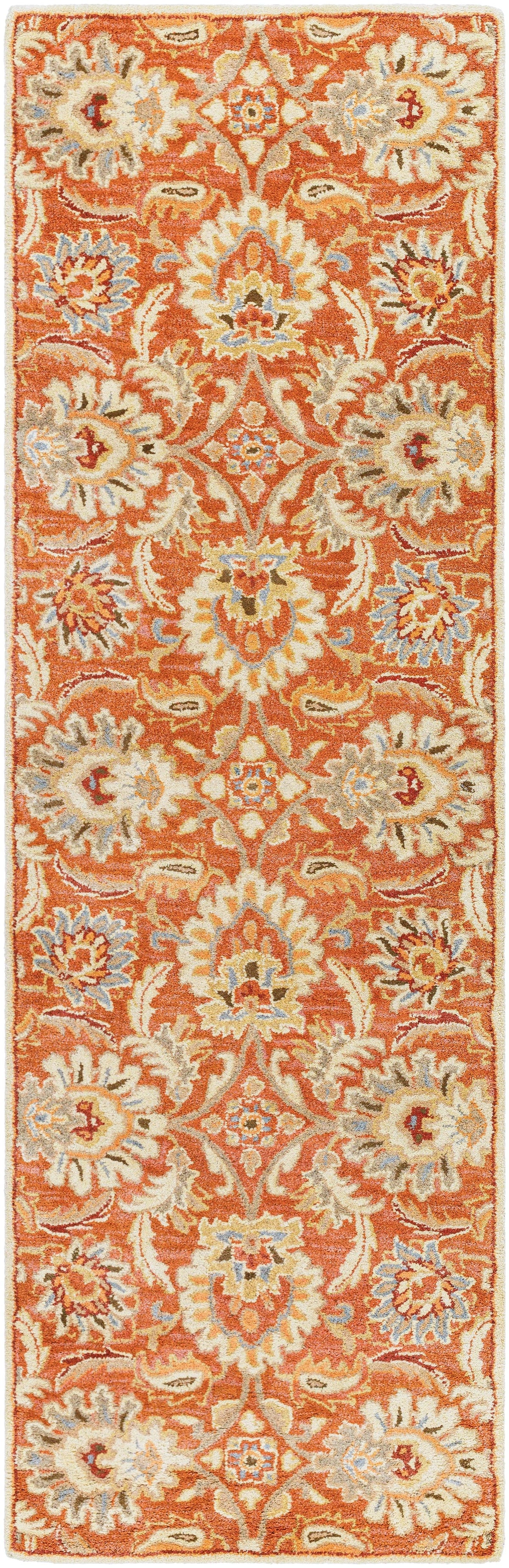 Mediterranean Cider hand-tufted wool runner rug with burnt orange floral patterns.