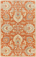 Mediterranean Cider hand-tufted wool rug with burnt orange floral patterns