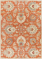 Mediterranean Cider hand-tufted wool rug with burnt orange floral pattern