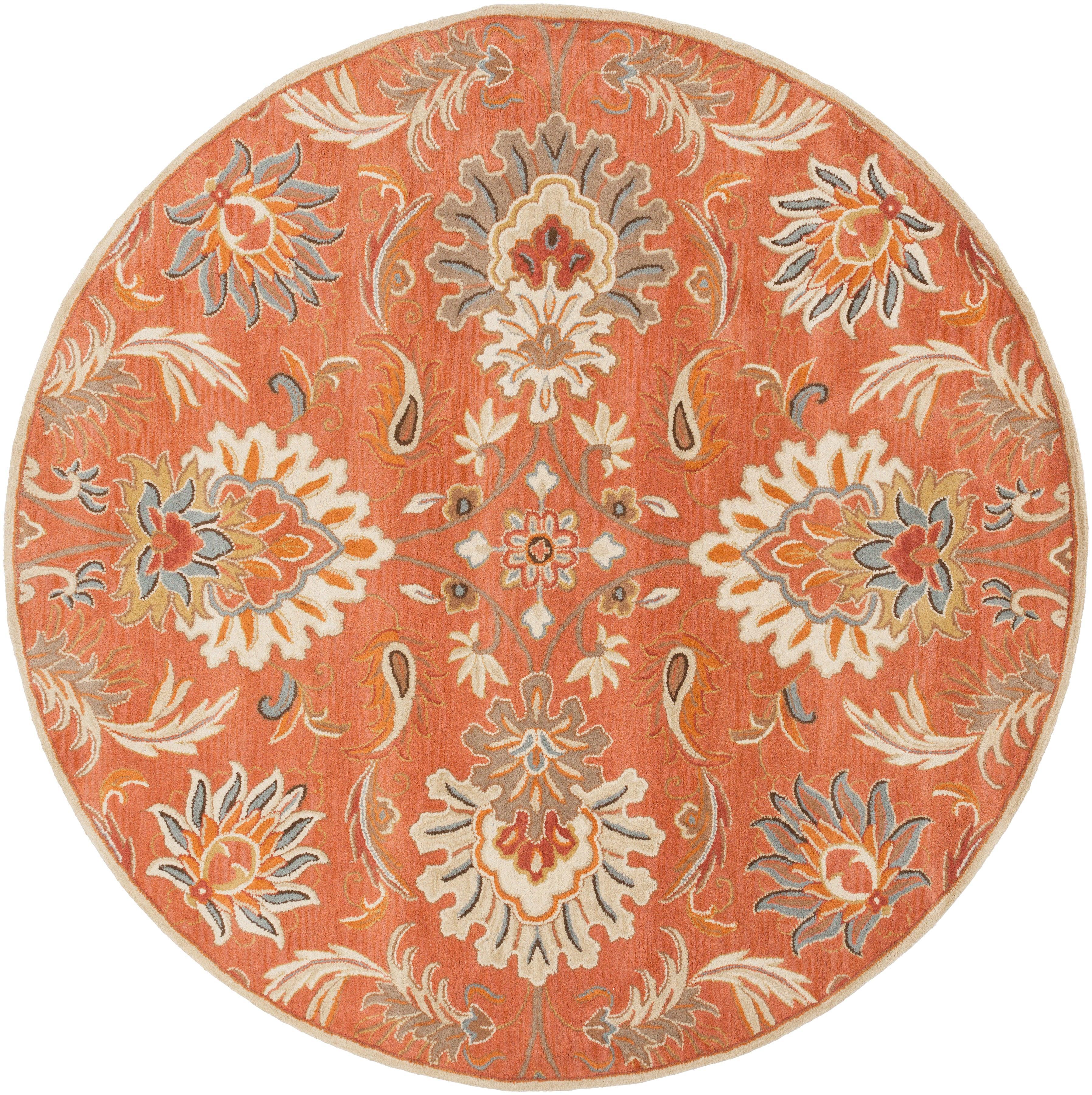 Round burnt orange Mediterranean Cider hand-tufted wool rug with floral patterns