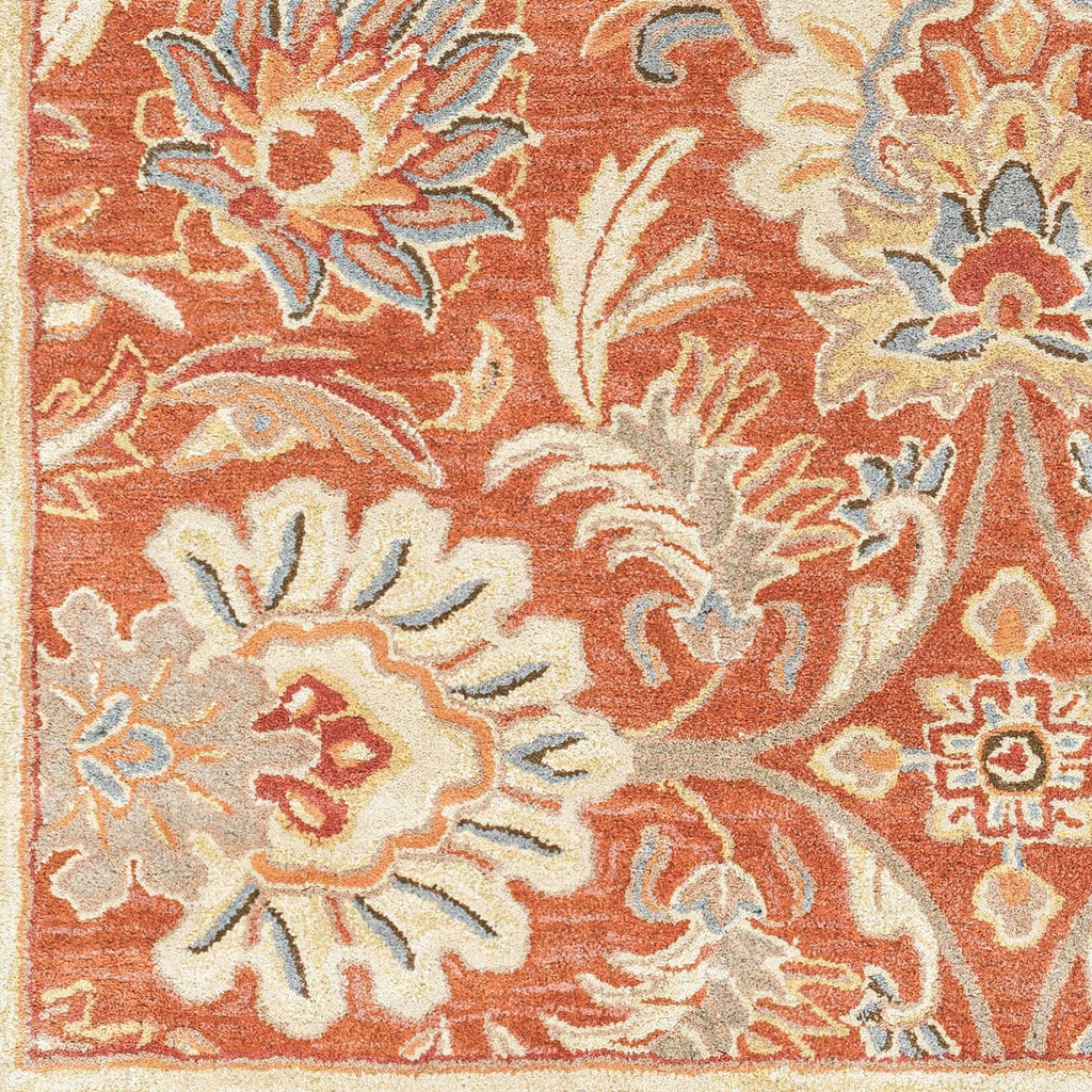 Mediterranean Cider hand-tufted wool rug with burnt orange floral patterns
