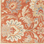 Mediterranean Cider hand-tufted wool rug with burnt orange floral patterns