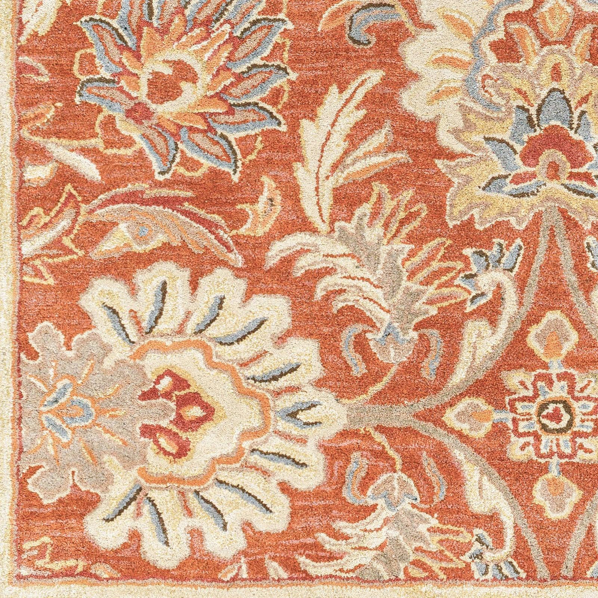 Mediterranean Cider hand-tufted wool rug with burnt orange floral patterns