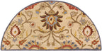 Half-circle Mediterranean wool rug with floral patterns in red, olive, and blue.