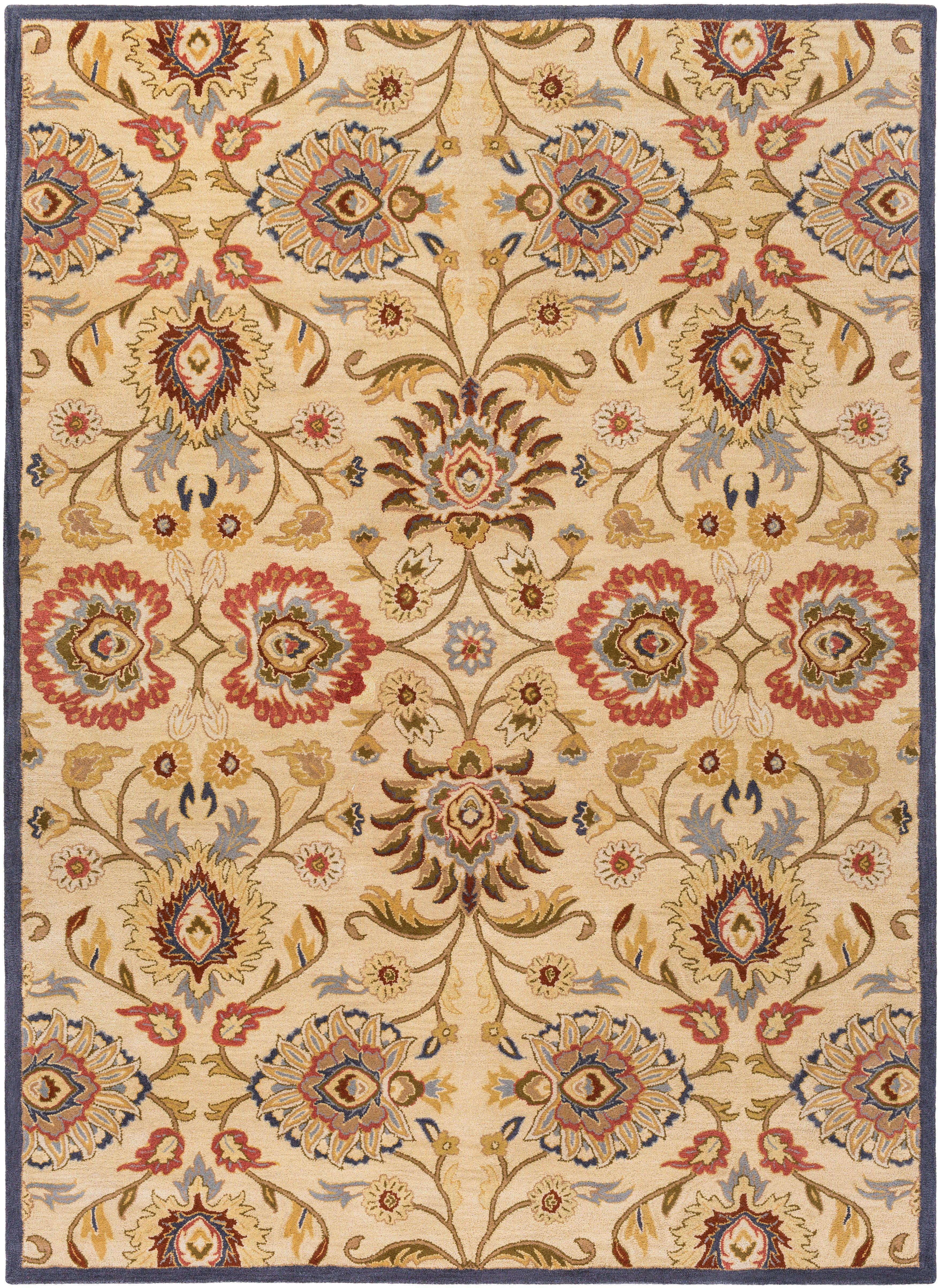 Mediterranean hand-tufted wool rug with red and blue floral patterns on a tan background.