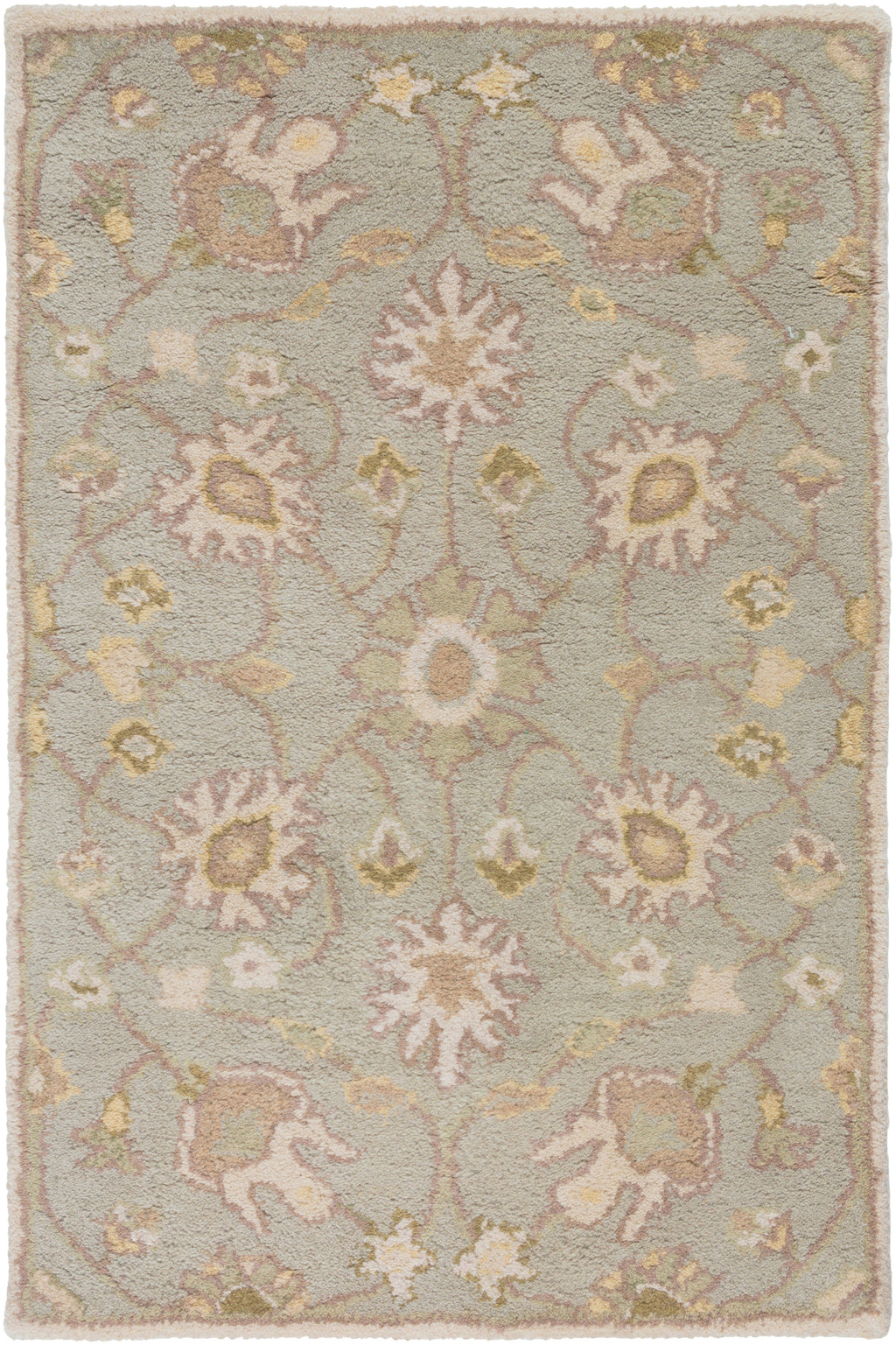 Giardino Stone hand-tufted wool rug with a floral pattern in blue-grey, beige, and gold.