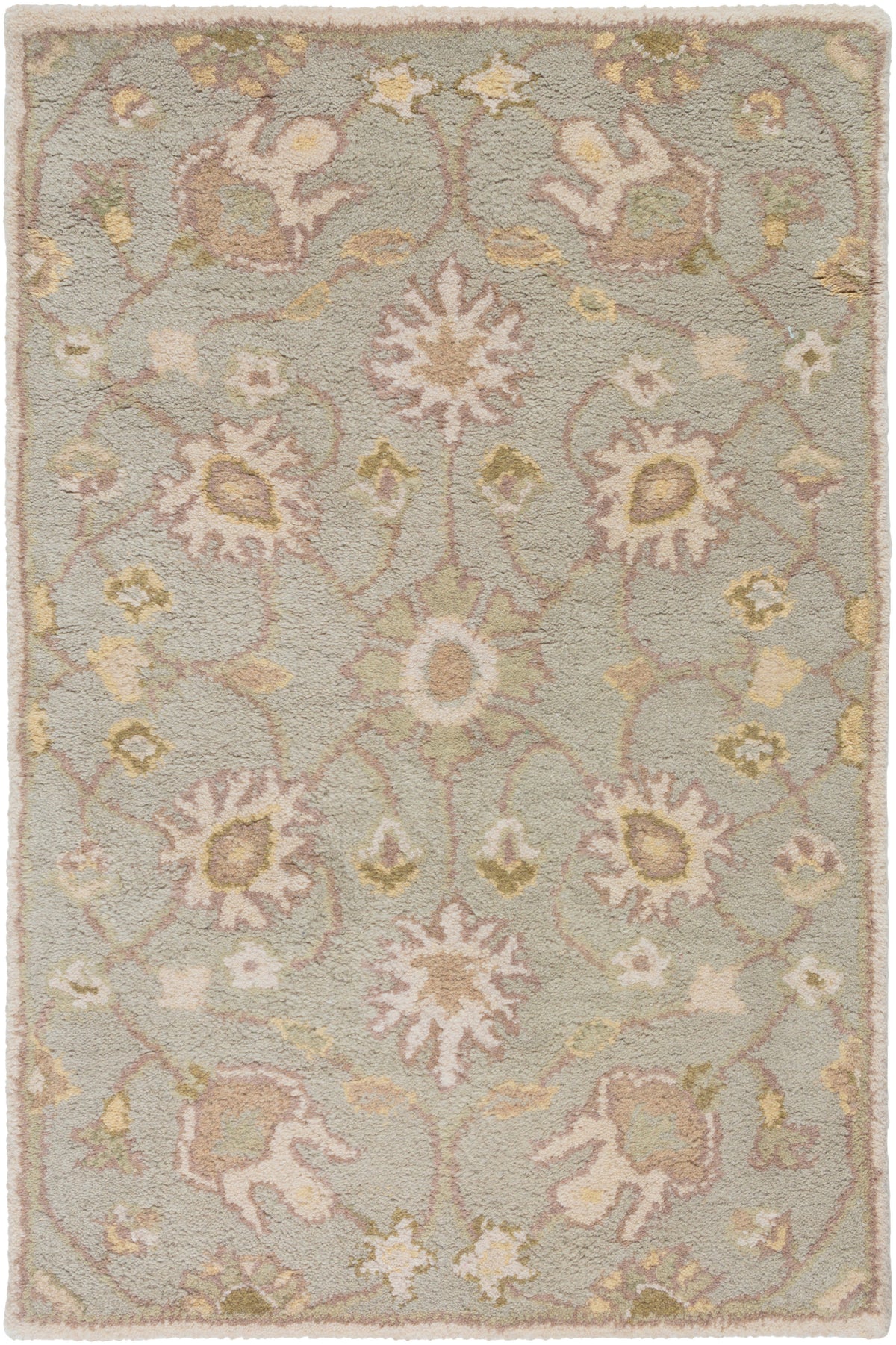 Giardino Stone hand-tufted wool rug with a floral pattern in blue-grey, beige, and gold.